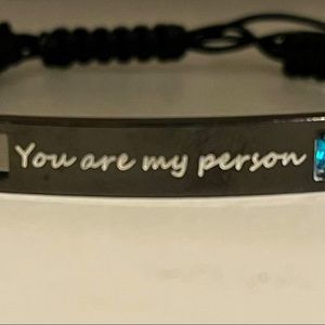 Black adjustable unisex bracelet with turquoise stone.